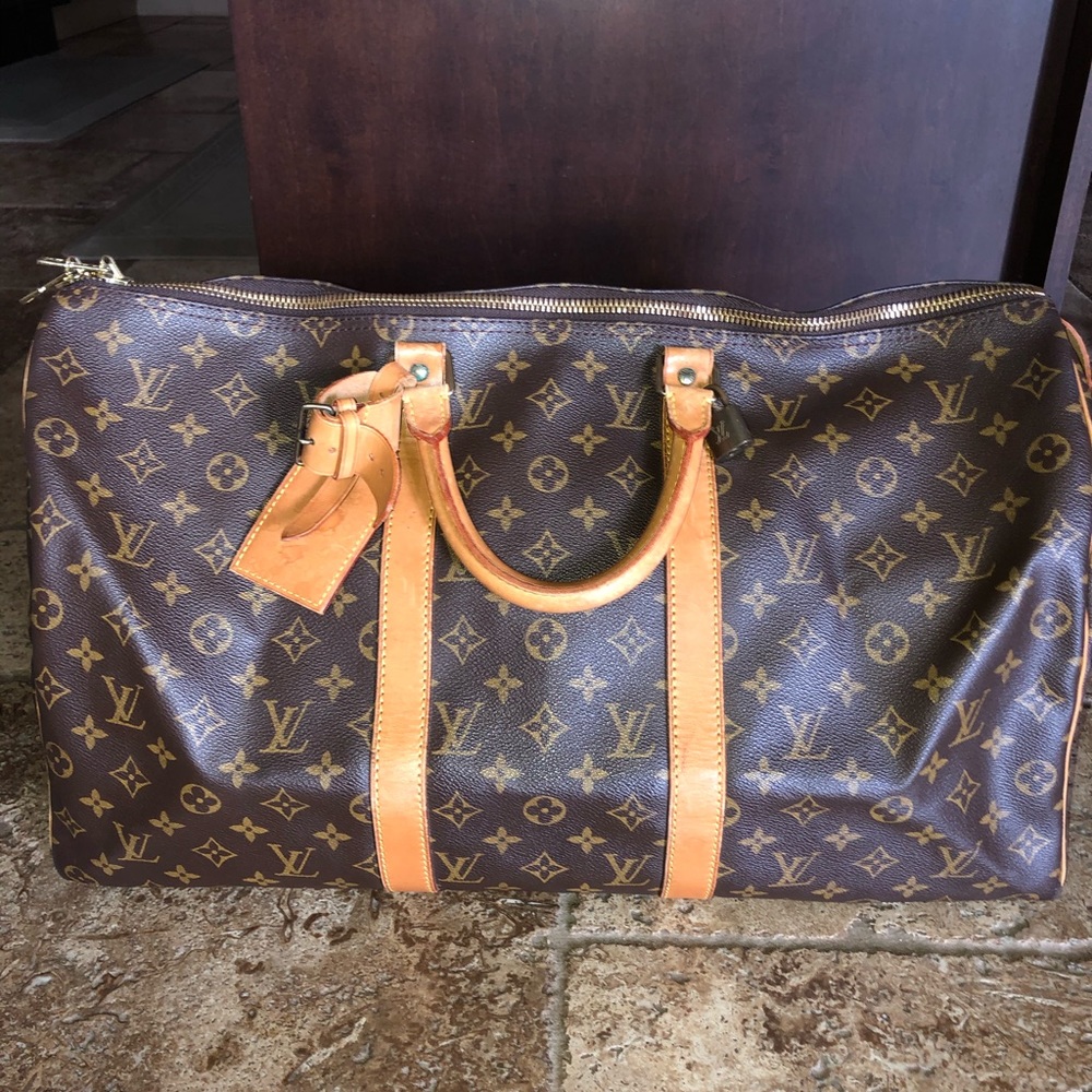 SOLD—Authentic Louis Vuitton keepall 50 w lock - Picture 1 of 6